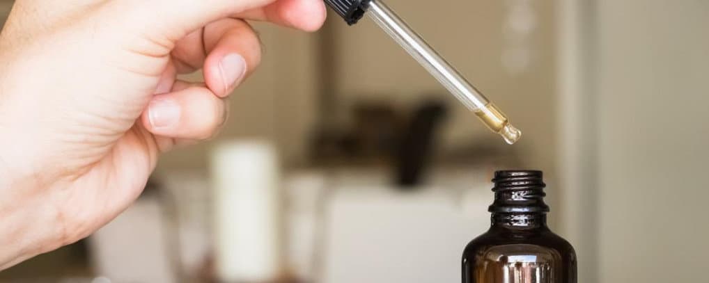 extracting colloidal silver from a dark bottle with a dropper