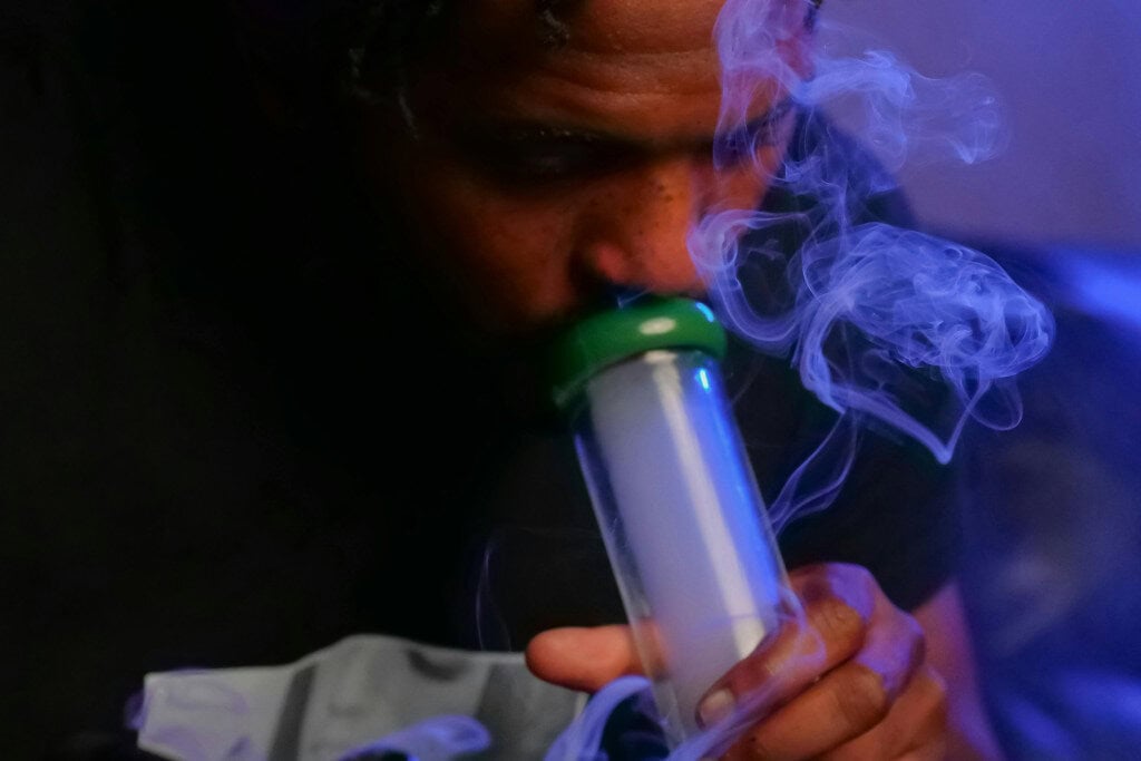 man using bong - featured image
